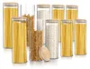 A collection of glass storage jars filled with pasta and rice, with bamboo lids. Anteprima dell’immagine prodotto
