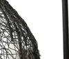 A close-up view of a woven hanging chair. Náhled obrázku produktu