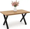 A coffee table with a vase of pink flowers on it, set against a white background. Produktbild-Vorschau