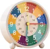 A colorful analog alarm clock for children learning to tell time. Produktbild-Vorschau