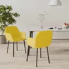 Two yellow chairs are placed in a dining room setting with a table and a plant. Náhled obrázku produktu