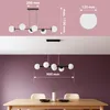 The image shows a diagram of a pendant lamp with dimensions and a lifestyle shot of the lamp installed above a dining table. Produktbild-Vorschau