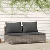A two-seater outdoor sofa with gray cushions sits on a wooden deck in front of a white, slatted wall with green vines growing over it. Podgląd zdjęcia produktu