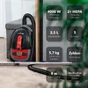 A vacuum cleaner with its accessories and feature callouts. Produktbild-Vorschau