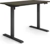 A modern, adjustable standing desk with a dark wood-effect top and dark gray metal legs, shown against a plain white background.