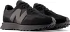 A pair of black New Balance sneakers is shown against a white background. Anteprima dell’immagine prodotto