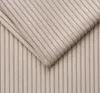 A close-up of beige corduroy fabric with thin gray stripes. Produktbild-Vorschau