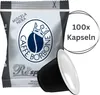 A bag of coffee capsules and one loose capsule. Náhled obrázku produktu