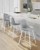 A modern kitchen island with three gray bar stools. Náhled obrázku produktu