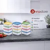 A kitchen counter with several stacks of food storage containers. Produktbild-Vorschau