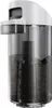 A close-up, side view of an automatic soap dispenser with a clear reservoir filled with dark liquid. Produktbild-Vorschau