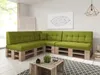 A modern living room with a sectional sofa made of pallets and green cushions. Produktbild-Vorschau
