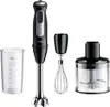 A hand blender set with accessories, including a beaker, whisk, and chopper attachment. Produktbild-Vorschau