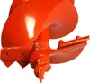 Close-up of an orange auger drill bit. Anteprima dell’immagine prodotto