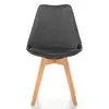 A gray velvet chair with wooden legs on a white background. Podgląd zdjęcia produktu