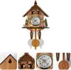 A cuckoo clock with a wooden house design, featuring figures, a deer, and trees. The clock face is visible, and a pendulum hangs below. Several close-up shots of the clock's details are also shown. Produktbild-Vorschau