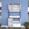 A white and wood cabinet with doors and shelves against a blue wall. Produktbild-Vorschau
