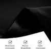 A close-up of black fabric with text and icons indicating product features. Voir les images du produit