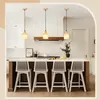 A modern kitchen island with pendant lights and bar stools. Produktbild-Vorschau