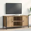 A TV stand with a TV mounted on the wall above it. Náhľad obrázku produktu