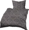 A duvet cover and pillow with a geometric pattern. Náhled obrázku produktu