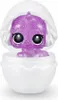 A purple glittery toy creature with large eyes and white hair is emerging from a white egg-shaped container. Anteprima dell’immagine prodotto