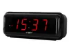 A black digital alarm clock with a red LED display showing the time. Náhľad obrázku produktu