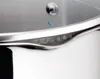 A close-up view of the rim and lid of a stainless steel pot. Podgląd zdjęcia produktu