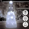 A decorative LED Santa Claus figure illuminated with white lights, placed outdoors in a snowy environment. Produktbild-Vorschau