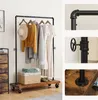 A clothing rack with clothes and accessories, shown in a lifestyle setting with additional detail shots of the product's construction. Náhled obrázku produktu