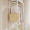 Beige Tasche am Seitengitter des weißen SoBuy Garderobenständers Produktbild-Vorschau
