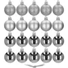A collection of silver Christmas ornaments arranged in rows. Anteprima dell’immagine prodotto