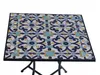A square mosaic table with a black metal frame, set against a white background. Produktbild-Vorschau