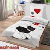 A bedroom scene with a bed dressed in cartoon-themed bedding. Produktbild-Vorschau