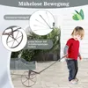 A young child is pulling a wooden wagon with a plant in it, outdoors on a paved area. Voir les images du produit