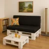 A living room scene with a pallet sofa and coffee table. Produktbild-Vorschau