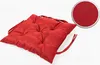 A red seat cushion is shown on a white background, with a close-up inset of the fabric texture. Produktbild-Vorschau