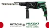 A rotary hammer drill with a drill bit attached, shown against a white background. Below the drill is a logo transition from Hitachi to HiKOKI. Anteprima dell’immagine prodotto