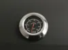 A close-up of a thermometer on a dark surface. Produktbild-Vorschau