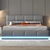 A modern upholstered bed with LED lighting. Produktbild-Vorschau