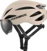 A studio shot of a beige bicycle helmet with a dark visor and black straps. Produktbild-Vorschau