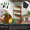 A multi-tiered wooden planter with plants, gardening tools, and decorative elements on a patio. Produktbild-Vorschau