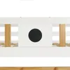A close-up view of a white bunk bed with wooden supports and a black circular detail. Produktbild-Vorschau
