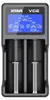 A close-up front view of a black Xtar VC2 battery charger with a blue digital display showing charging information. Anteprima dell’immagine prodotto