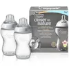 A product shot of Tommee Tippee baby bottles and their packaging. Produktbild-Vorschau
