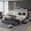 A modern bedroom with a large bed, nightstands, and a chair. Produktbild-Vorschau