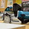 Close-up of a power tool, likely a biscuit joiner, on a workbench. Podgląd zdjęcia produktu