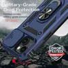A dark blue phone case with a ring holder is shown on a rocky surface, suggesting durability and protection. Produktbild-Vorschau