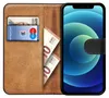 A book-style phone case with a phone inserted, showing cards and cash inside. Náhľad obrázku produktu