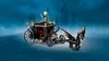 A LEGO Harry Potter carriage with a winged horse, set against a blurred background of buildings. Náhled obrázku produktu